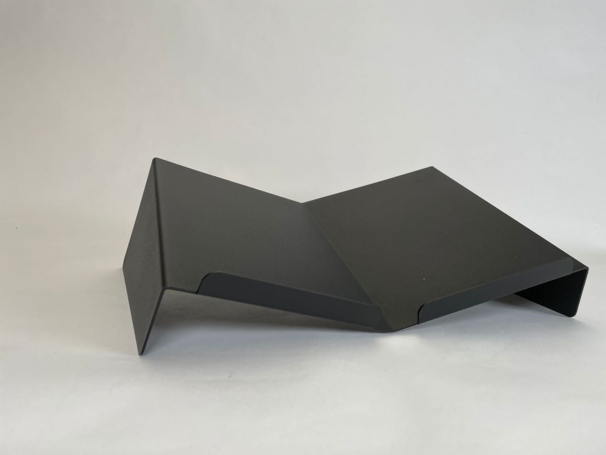 Boekenstandaard middel design in de kleur zwart van staal